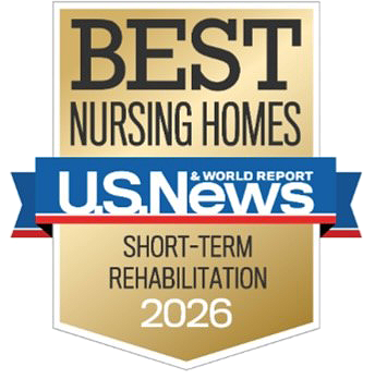 Badge with a gold and beige background, stating "Best Nursing Homes" at the top, with a blue and white banner that reads "U.S. News & World Report," and a gold section at the bottom that says "Short-Term Rehabilitation 2026."