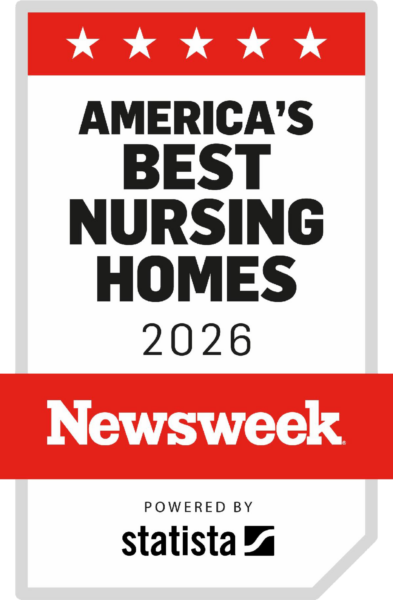 A vertical award badge with a red top border featuring five white stars. Below, bold black text reads "AMERICA'S BEST NURSING HOMES 2026." A red banner with white text displays "Newsweek." At the bottom, black text says "Powered by Statista."